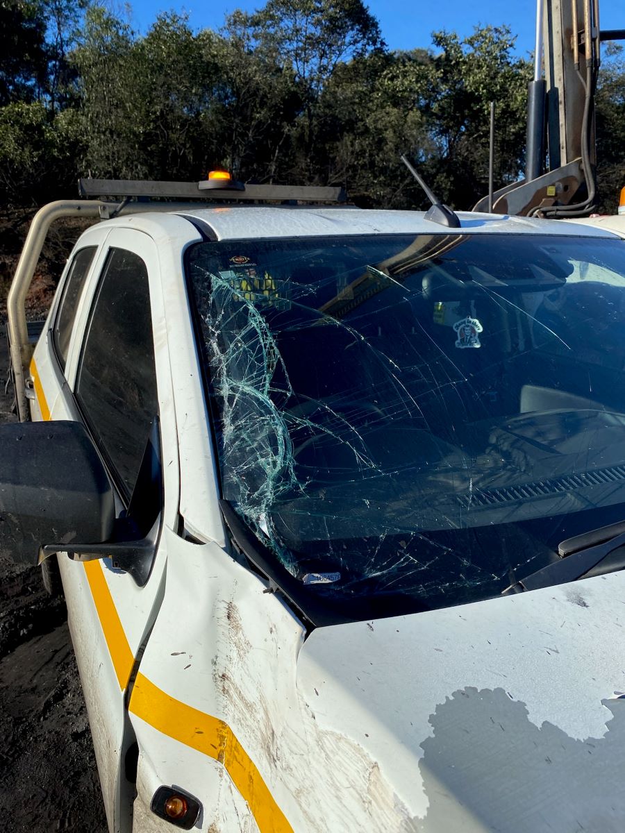 Damage to the ute as a result of the collision with the bulldozer
