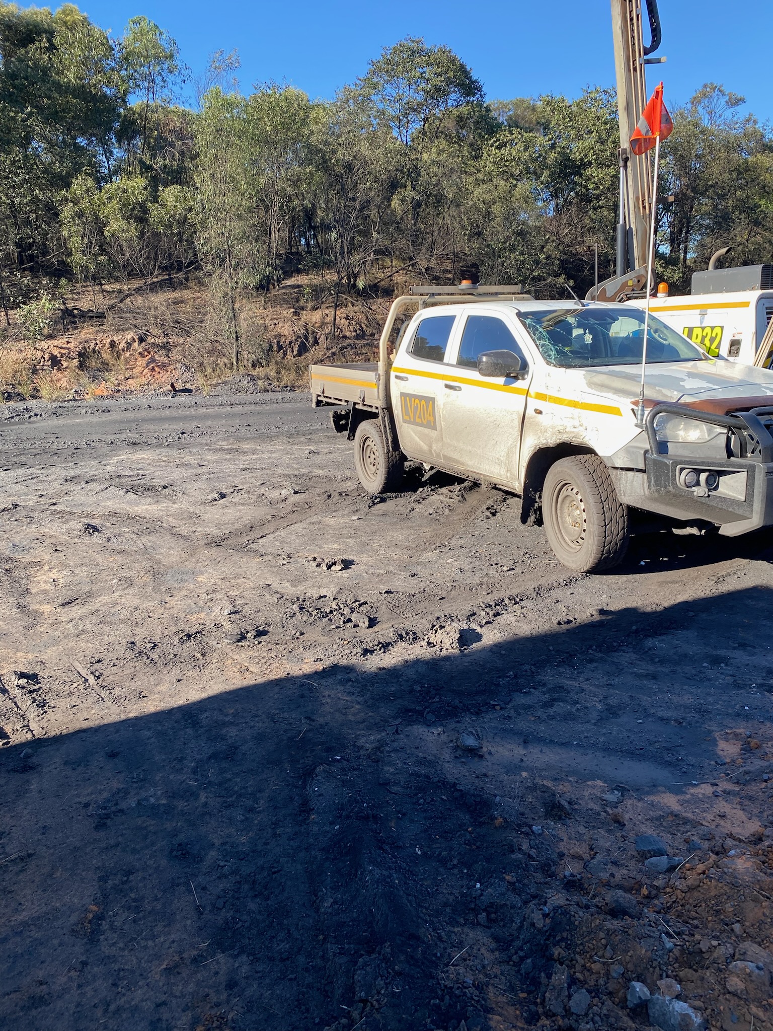 A ute pushed sideways on a dirt road